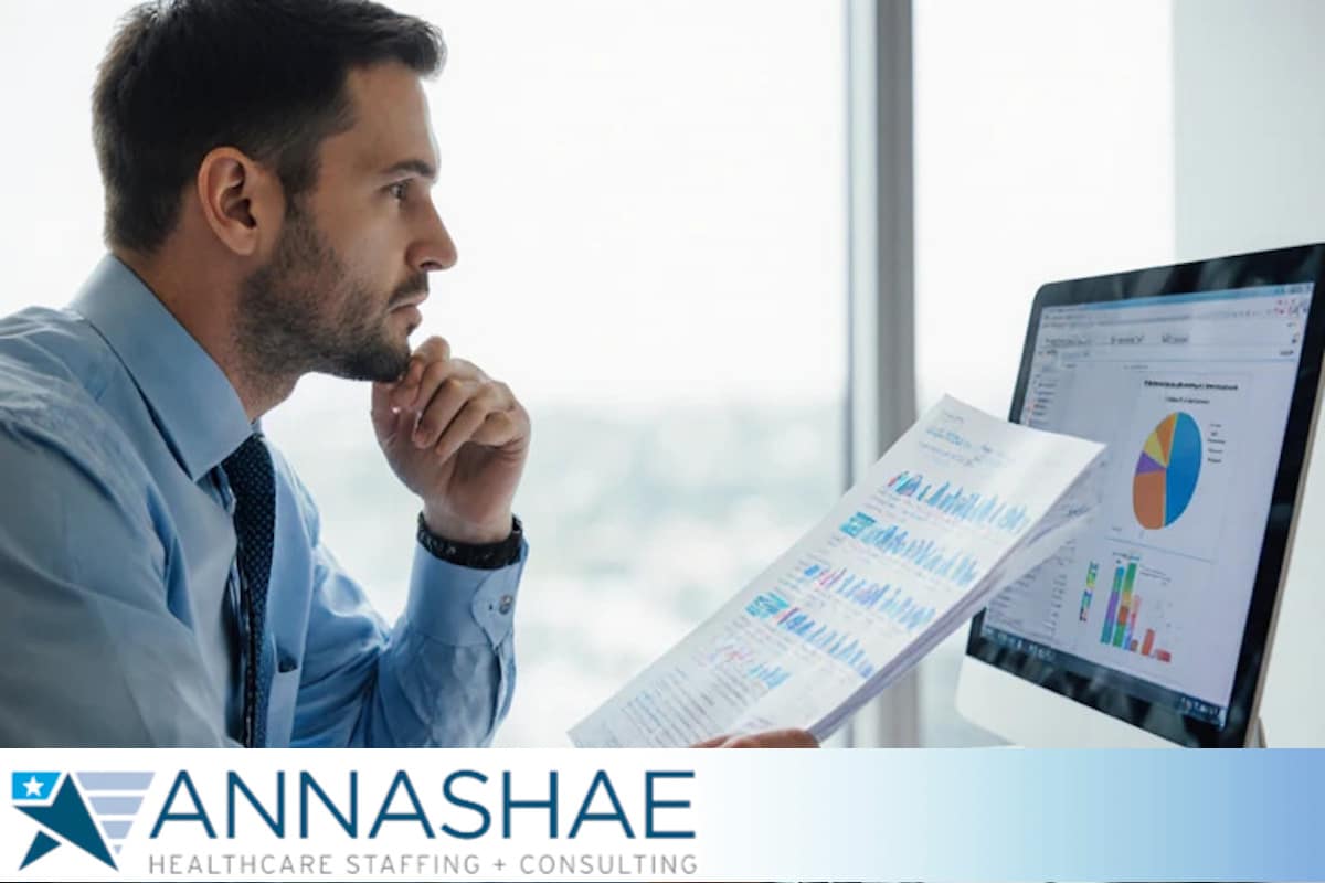 Staffing Strategy - An administrator reviews staffing strategy for healthcare quality