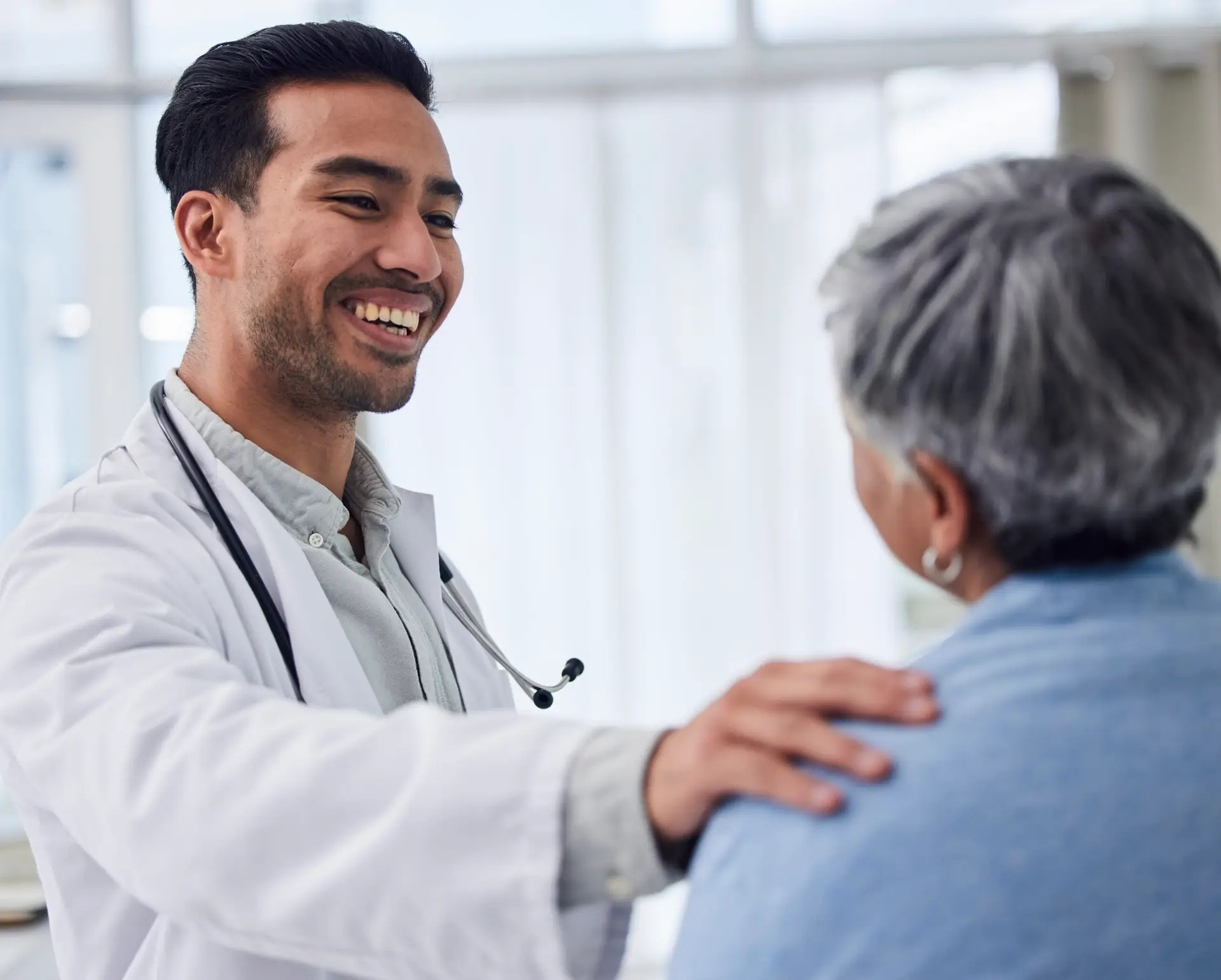doctor-consoling-senior-patient-in-hospital-settin-2026-03-25-02-18-41-utc